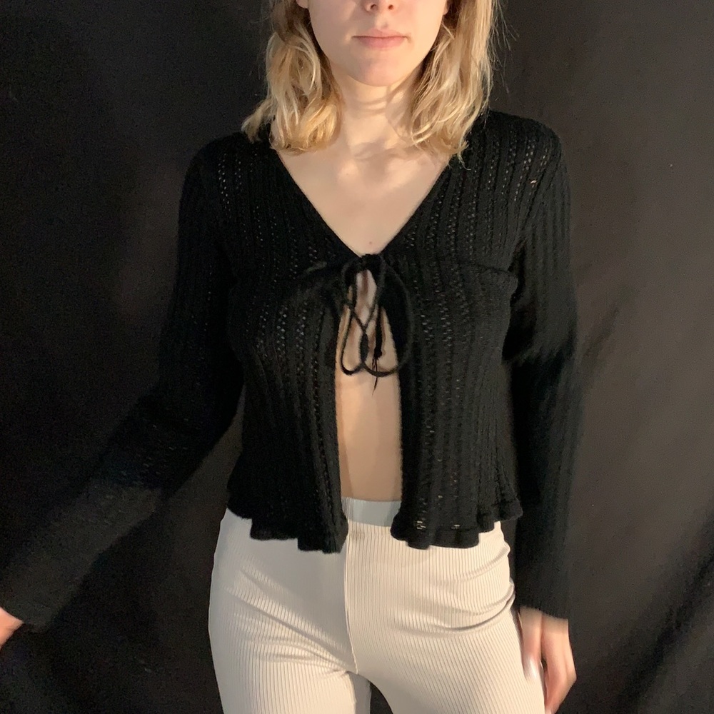 Black sweater size small, ties in front